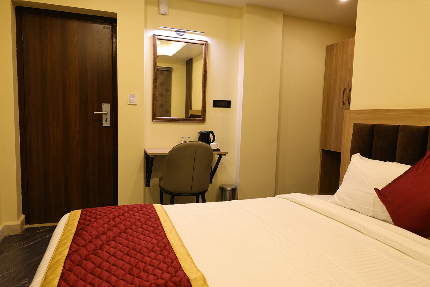 Deluxe Room at PM Grand Inn